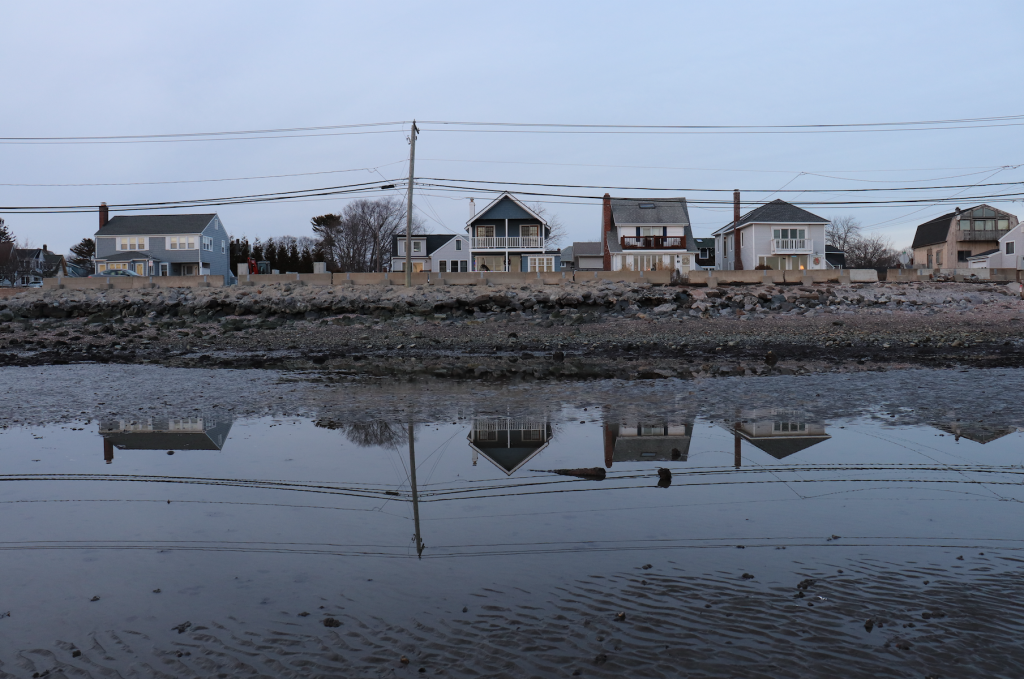 Houses reflected in the Long Island Sound